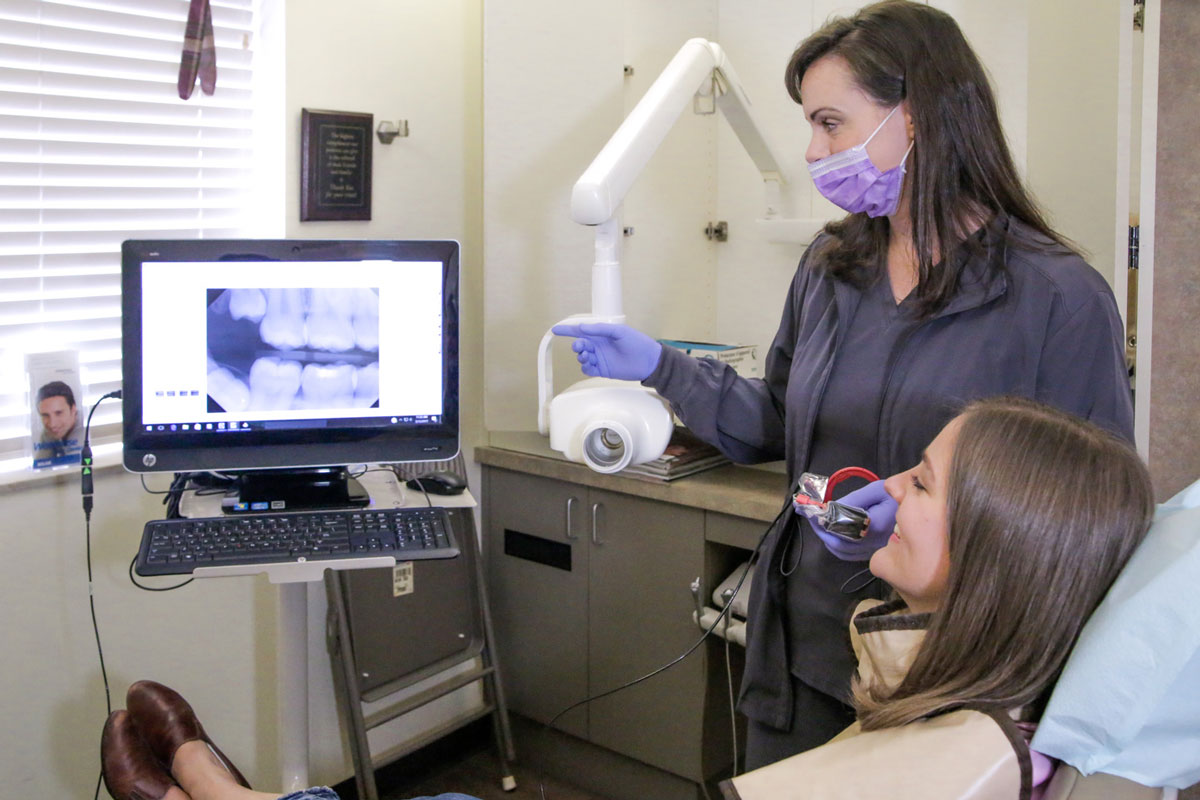 Dentist using dental imaging