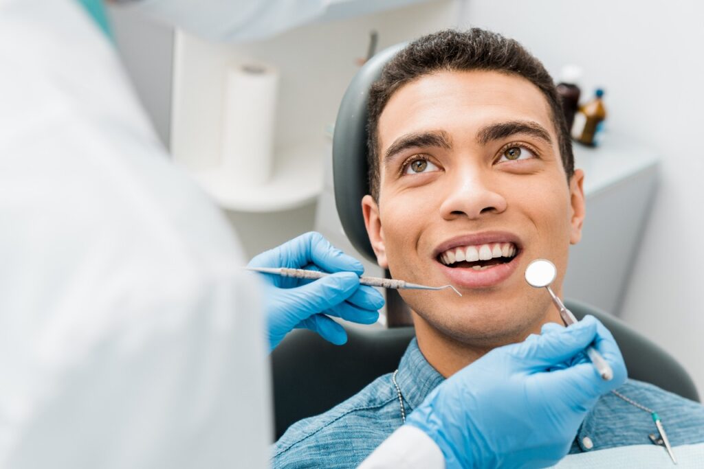 Young man getting a dental exam