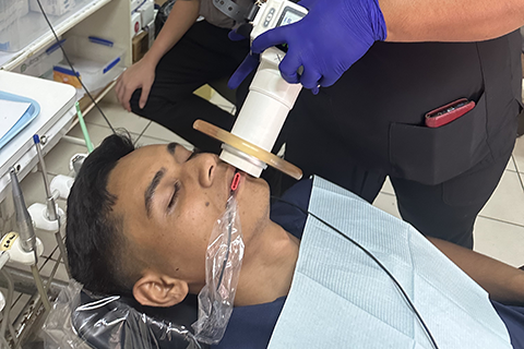 Samoan patient receiving an X-ray